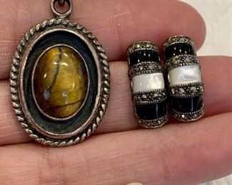 Item 264:  Sterling (Mexico) Tiger's eye pendant and two sets of earrings:  $28