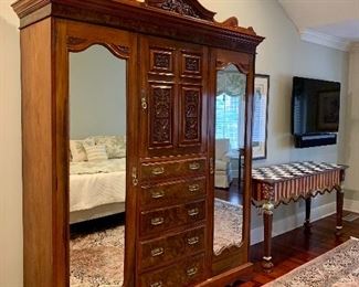 Item 138:  Fabulous Antique French Armoire, mirrored closet to either side for hanging clothing, drawers in middle, ornately carved - 68.5"l x 19"w x 87.5"h: $1200