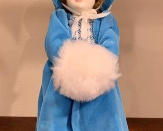 Item 153:  Doll in blue velvet, porcelain face - 12":  $18.00