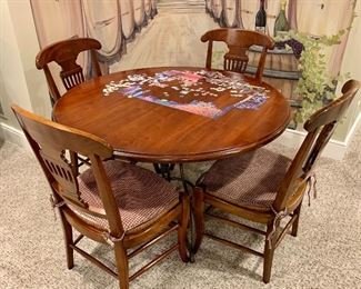 Item 215:  Table with (4) rush seat chairs:  $445                                          Table - 48.5" x 28"                                                                                                  (4) Chairs - 21.75"l x 17.75"w x 37"h