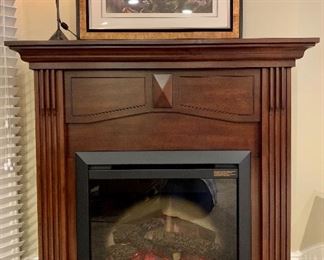 Item 217:  Electric fireplace - 44"l x 16.5"w x 43"h: $395