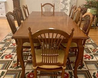 Item 336:  Absolutely gorgeous Drexel dining table with eight chairs. Chairs have pads. There are two extensions: $825 for set