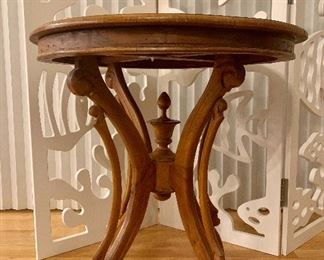Item 337:  Pretty little occasional table with ornate base: $250