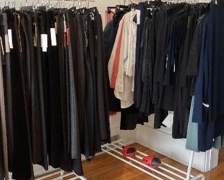 just two of the many racks of modern, simple clothing