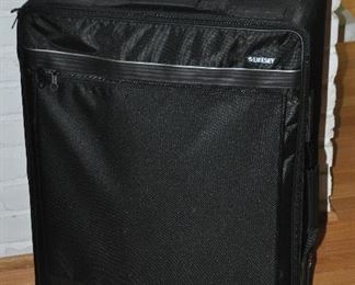 27" LIKE NEW ROLLING DELSEY BLACK CANVAS LUGGAGE. OUR PRICE $50.00