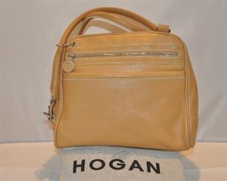 PRICE REDUCED!!  AUTHENTIC HOGAN CARMEL LEATHER DOUBLE HANDLE HANDBAG WITH SILVER HARDWARE AND ONE ZIPPER FRONT POCKET IN EXCELLENT CONDITION, (WITH DUST BAG). 10.5"W X 9.5"H X 6.5"D. OUR PRICE $85.00 