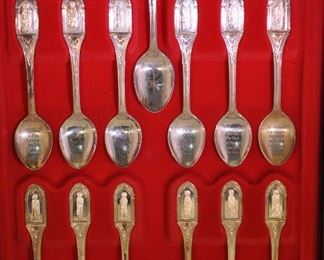 CLOSE UP VIEW OF THE 13 COLLECTOR STERLING SPOONS. OUR PRICE $450.00
