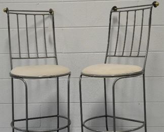 PAIR OF GREY METAL WITH BRASS DETAIL BAR STOOLS WITH IVORY CANVAS SEATS. 23” SEAT HEIGHT. 42” TOTAL HEIGHT. CHARLESTON FORGE MADE IN USA. AS IS CONDITION. OUR PRICE $100.00 PAIR