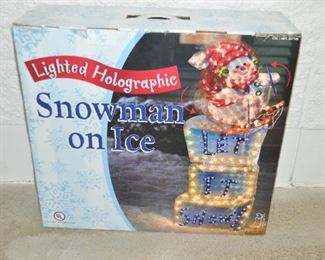 NEW IN BOX. LIGHTED HOLOGRAPHIC SKIING SNOWMAN ICE "LET IT SNOW" ANIMATED OUTDOOR  CHRISTMAS DECOR, 45.5"H. OUR PRICE $45.00 