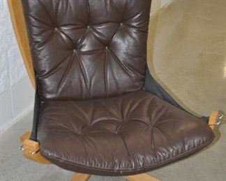 MID CENTURY MODERN FALCON STYLE LOUNGE CHAIR BY PLYDESIGNS, MADE IN CANADA.  GENUINE BROWN LEATHER.  CHAIR AND CUSHION IN VERY GOOD CONDITION.  TWO ARE AVAILABLE.  OUR PRICE $400.00 EACH. 