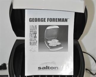 GEORGE FOREMAN GR20 LEAN MEAN FAT REDUCING GRILLING MACHINE.  ONLY SLIGHTLY USED.  OUR PRICE $30.00 