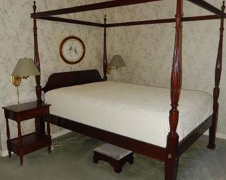Four post bed with tester; NOTE: wall lamps are not for sale.