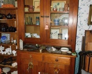 One of the Step-Backs, this is an OHIO valley 19th C. cupboard in a soft color with glass door top. 