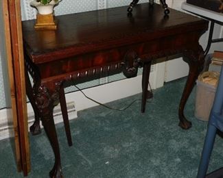 This is an expandable table...needs a little refinishing in spots but its a conversation piece for sure !