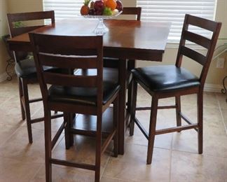 Pub table with chairs