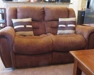 Power reclining love seat