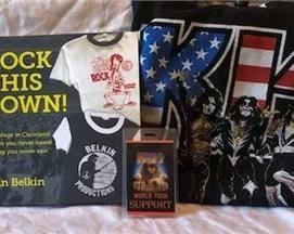 Lot 122
Kiss "Access" Passes, Kiss shirt (xl) + signed "Rock This Town! Backstage." book