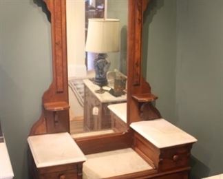 Antique mirrored dresser with marble tops