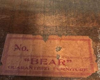 Label on the bottom of drawer of mission oak desk. Bear guaranteed furniture