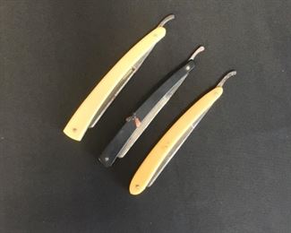 Three vintage straight razors