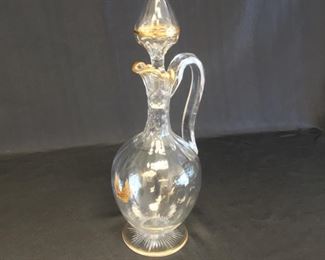 Crystal decanter with gold accents