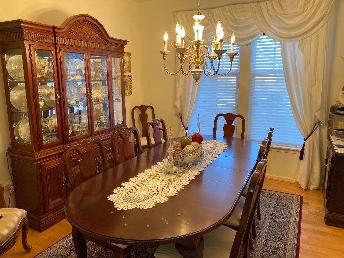 Cherry wood dining room sets Beautiful condition table -8 chairs China cabinet and  Server
