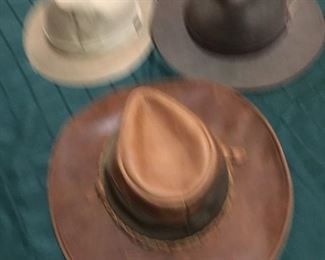 assortment of vintage hats/cowboy hats