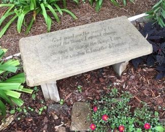 Cement bench, carved with verse