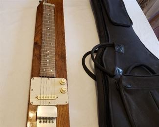 custom lap steel guitar in solid oak 