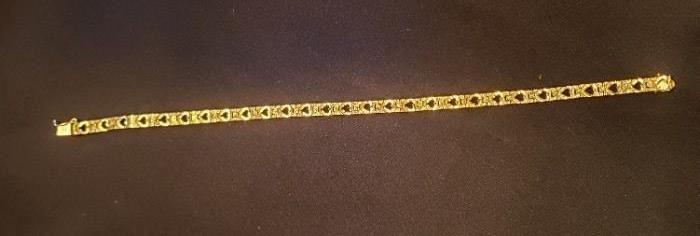 14k yellow gold  nugget style heart bracelet 