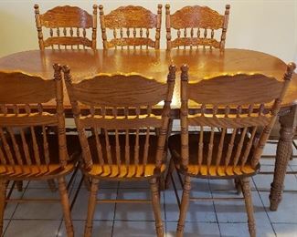 Ten piece oak dining table & eight side chairs
