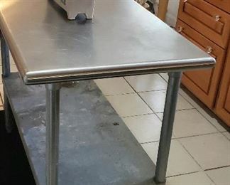 Stainless steel shelf table
