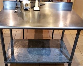Stainless steel work table with back splash
