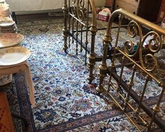 Antique brass beds; Tabriz rug