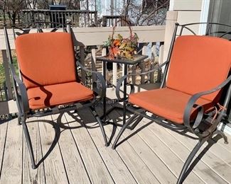Patio furniture with new, rust-collored cushions for sale.