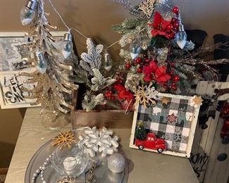 A variety of creative, holiday decor for sale.