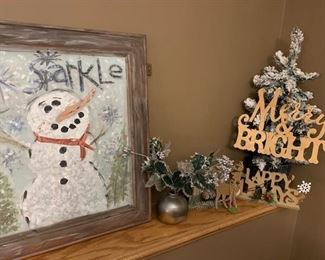 A variety of creative, holiday decor for sale.
