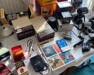 Table full of camera equipment 