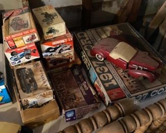 Model cars. Some unassembled in box