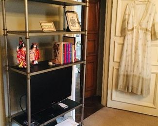 fine books, bookcases, and vintage clothing