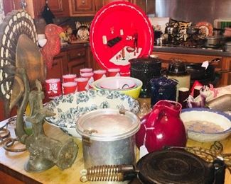 unusual and fun kitchenware including a Wagnerware early cast iron waffle iron--Do you see the giant wooden turkey?