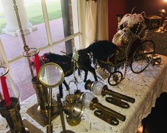 precious Christmas carriage and horses, 19th c. brass English carriage lights, a 1910 brass kerosene USA made bicycle light and many other examples of antique brass