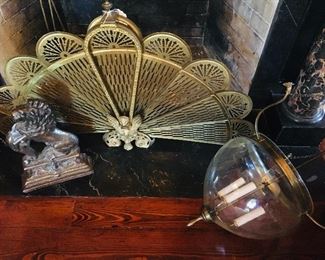 Antique fireplace screen, fine old French door stop, and I especially love the A. Hayes Town original entrance light fixture