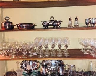 Baccarat stemware, fine old silver, fun modern crystal vases