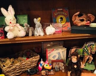 lots of Steiff stuffed rabbits, bears, and monkeys