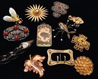 Mrs. Mangham wore a unique pin on her suit lapel every day.  We will offer trays of  unique jewelry