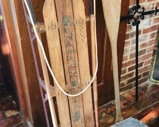 primitives like a turn of the last century full size wooden sled, a 19th century chest with HR (her royal highness?) in brass studs,