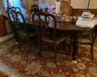 Dining table with 8 chairs $600.  Handmade Persian Rug $600.
