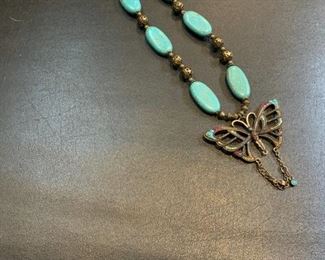 Butterfly and green stone necklace - $5