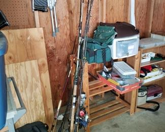 Some of the many fishing poles and fishing equipment